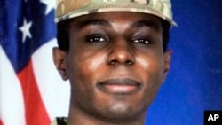 This portrait of American soldier Travis King is displayed at the home of his grandfather Carl Gates, July 19, 2023, in Kenosha, Wisconsin.