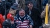 Robert Palmer outside the Capitol building during the Jan. 6, 2021 Capitol riot.