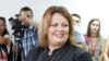 FILE - Public prosecutor Katica Janeva takes an oath as a special prosecutor to investigate claims that the conservative government ordered a massive wiretapping operation, Skopje, Macedonia, Sept. 16, 2015. Janeva unexpectedly resigned in July.
