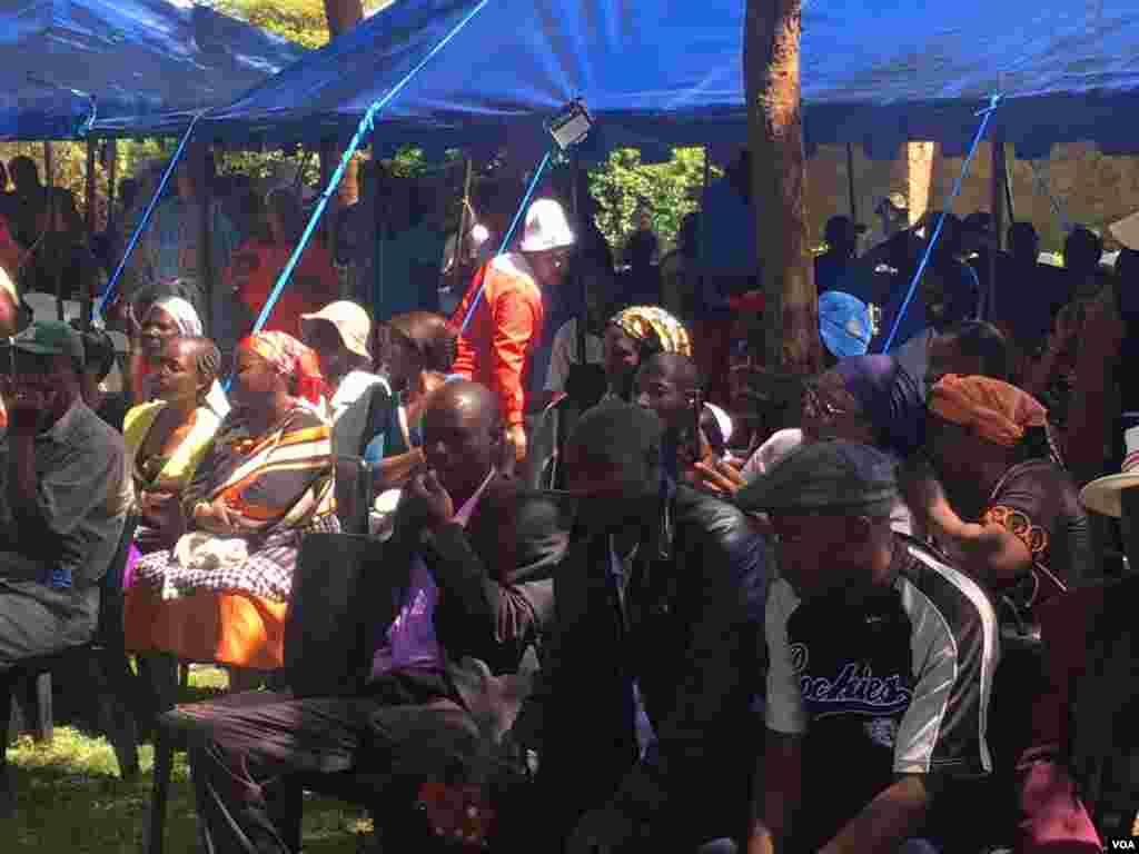 People attending Oliver Mutukudzi's funeral wake in Norton, 32 kilometers south west of Harare.