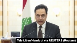 Hasan Dijab, libanski premijer, tokom obraćanja u kom je podneo ostavku (Foto: ele Liban/Handout via REUTERS)