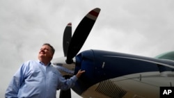Air Choice One CEO Shane Storz poses for a photo with one of his company's aircraft in St. Louis, March 28, 2017. Air Choice One is an airline based in St. Louis that flies small planes to destinations in the Midwest and participates in the Department of Transportation's Essential Air Service subsidy program. 