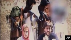 Cặp vợ chồng người Thụy Sĩ Olivier David Och và Daniela Widmer bị Taliban bắt làm con tin trong hơn 8 tháng.