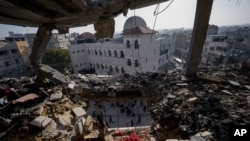 Oštećene zgrade u Rafi, na jugu Gaze (Foto: AP/Fatima Shbair)