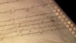 FILE - The word "Impeachment" as it is written in Article II of the U.S. Constitution, is seen on display in the Rotunda for the Charters of Freedom at the National Archives Museum in Washington.