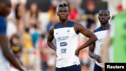 Paul Pogba et Moussa Sissoko, le 10 juin 2014. (REUTERS/Charles Platiau)