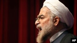 Le président iranien, Hassan Rohani, lors d’un rassemblement de campagne électorale. Téhéran, le 11 avril 2013. 