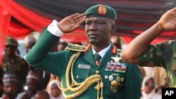 FILE - Nigerian army chief Lieutenant General Taoreed Lagbaja salutes during a funeral ceremony for officers in Abuja, Nigeria, on March 27, 2024. Nigerian President Bola Tinubu announced Lagbaja's death on Nov. 6, 2024.