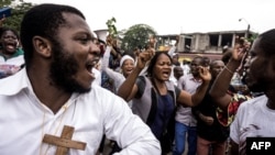 Ba katolko na bato basusu batamboli na Kinshasa, le 31 décembre 2017.