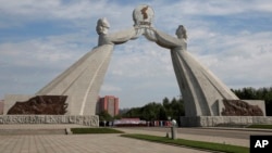FILE - The Arch of Reunification, a monument to symbolize the hope for eventual reunification of the two Koreas, pictured in Pyongyang, North Korea, Sept, 11, 2018. 