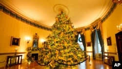 The Blue Room of the White House is decorated during the 2020 Christmas preview, Nov. 30, 2020, in Washington.