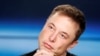 FILE - Elon Musk listens at a press conference following the first launch of a SpaceX Falcon Heavy rocket at the Kennedy Space Center in Cape Canaveral, Florida, U.S., Feb. 6, 2018. 