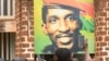 Supporters of the late president Thomas Sankara gather at the his memorial site in Ouagadougou