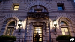 A man walks up the steps of the 9th U.S. Circuit Court of Appeals building, Feb. 9, 2017, in San Francisco. A federal appeals court refused Thursday to reinstate President Donald Trump's ban on travelers from seven predominantly Muslim nations, dealing another legal setback to the new administration's immigration policy. 