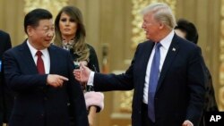 U.S. President Donald Trump China's President Xi Jinping arrive for the state dinner with the first ladies at the Great Hall of the People in Beijing, China, Nov. 9, 2017.