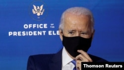 FILE PHOTO: U.S. President-elect Joe Biden announces members of his economic policy team in Wilmington, Delaware